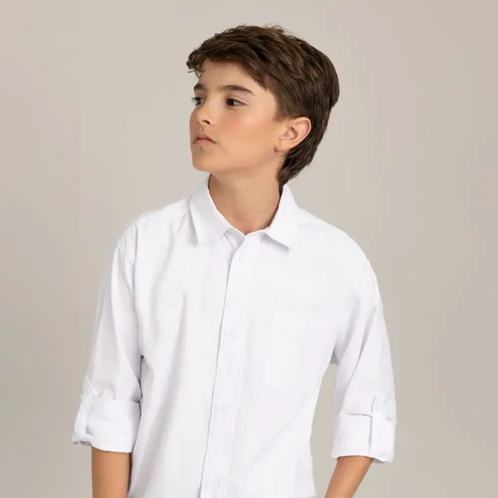 Camisa manga larga con bolsillo en tejido
