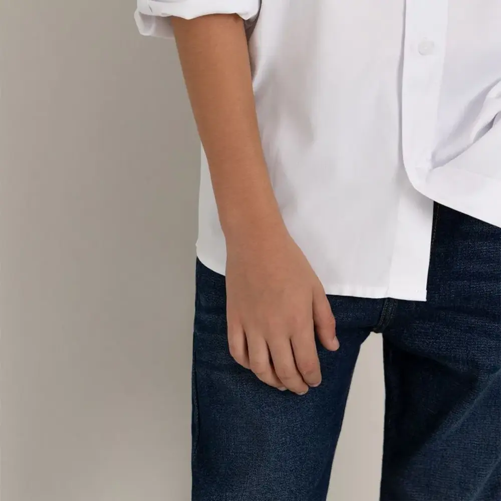 Camisa manga larga con bolsillo en tejido