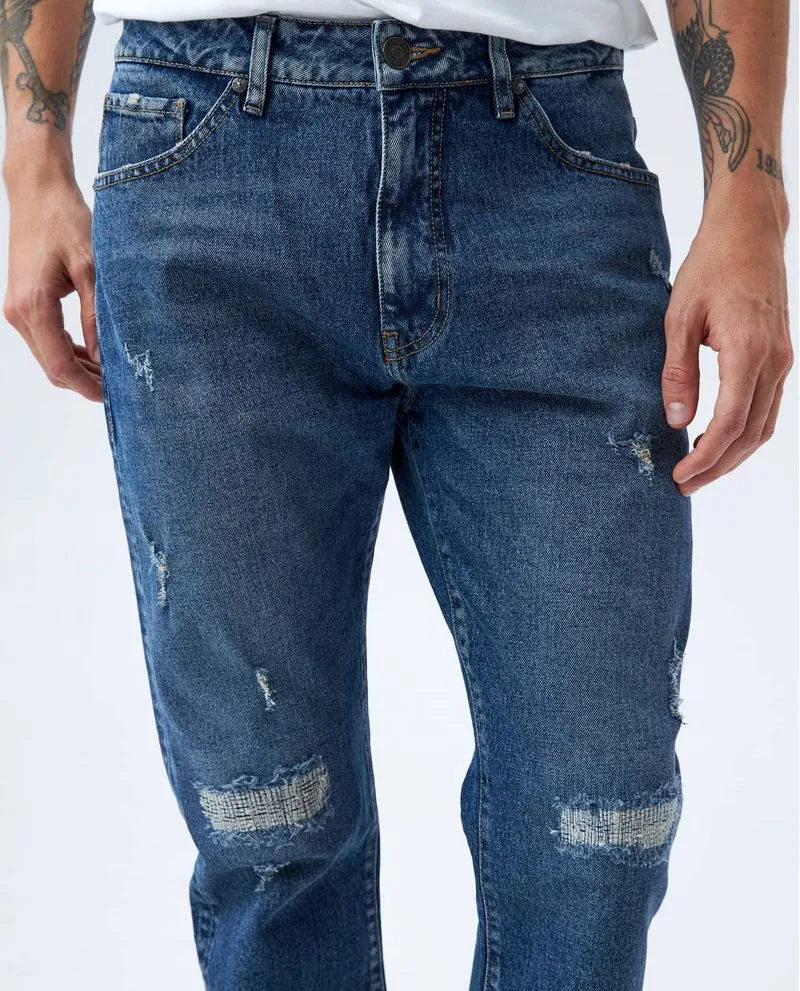 Jean Relaxed tono medio para hombre