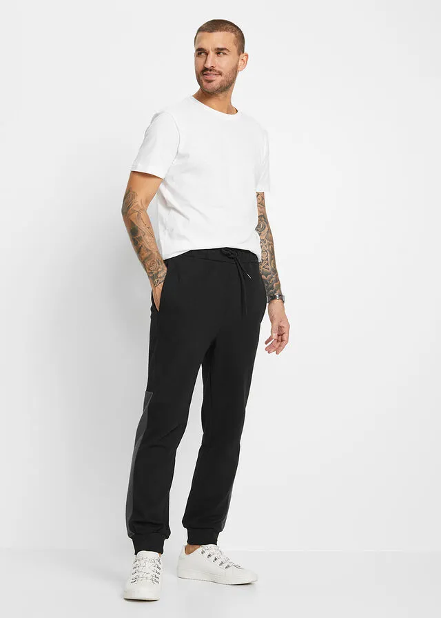 PANTALóN DE CHáNDAL CON POLIéSTER RECICLADO NEGROPIZARRA