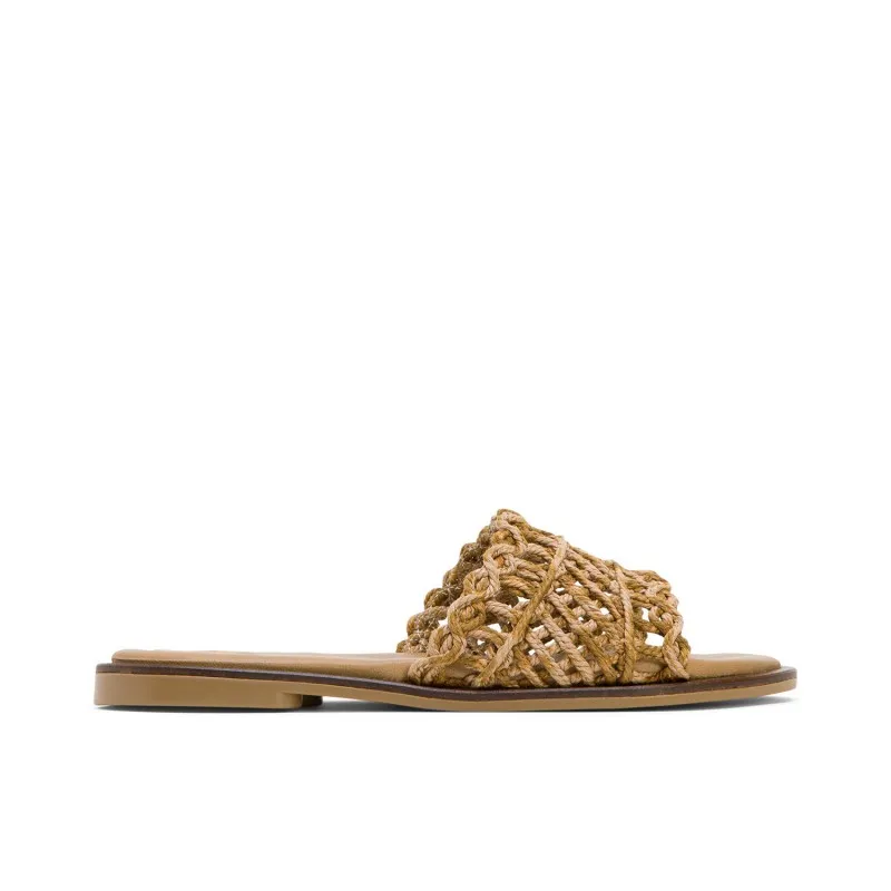 SANDALIA PLANA CON PALA TEXTIL CUERO CORA