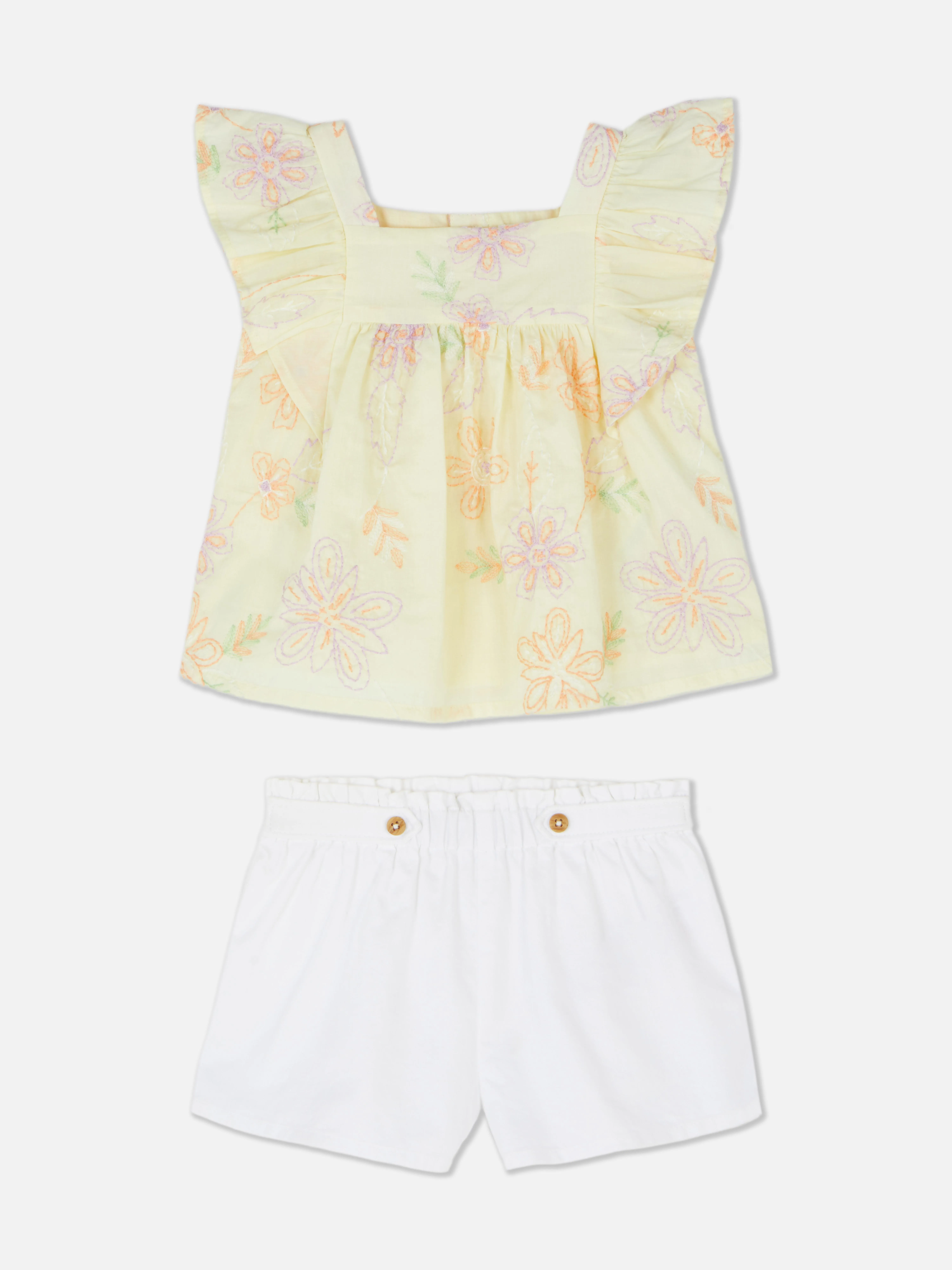 Set de blusa y pantalones cortos con flores bordadas