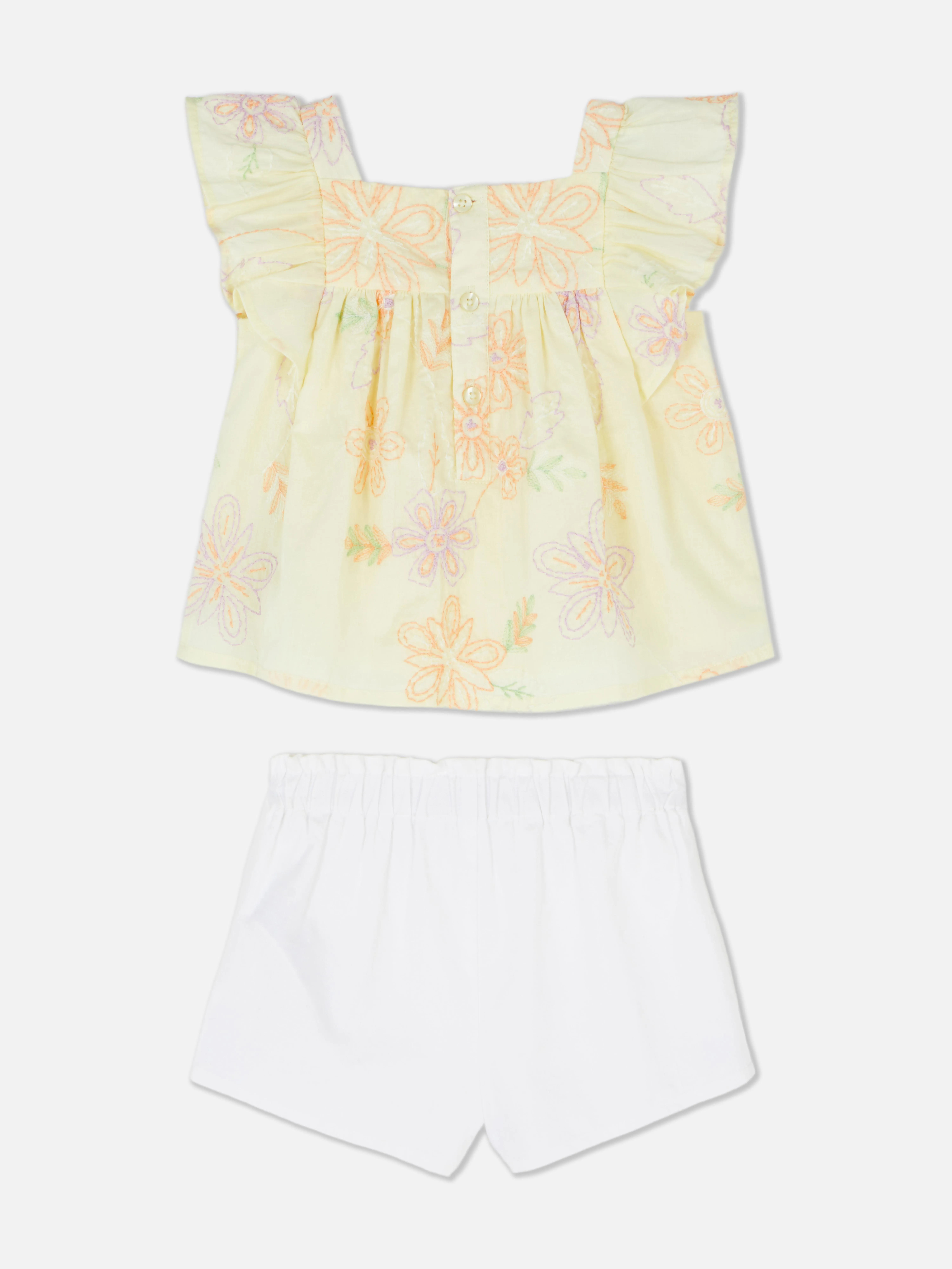 Set de blusa y pantalones cortos con flores bordadas